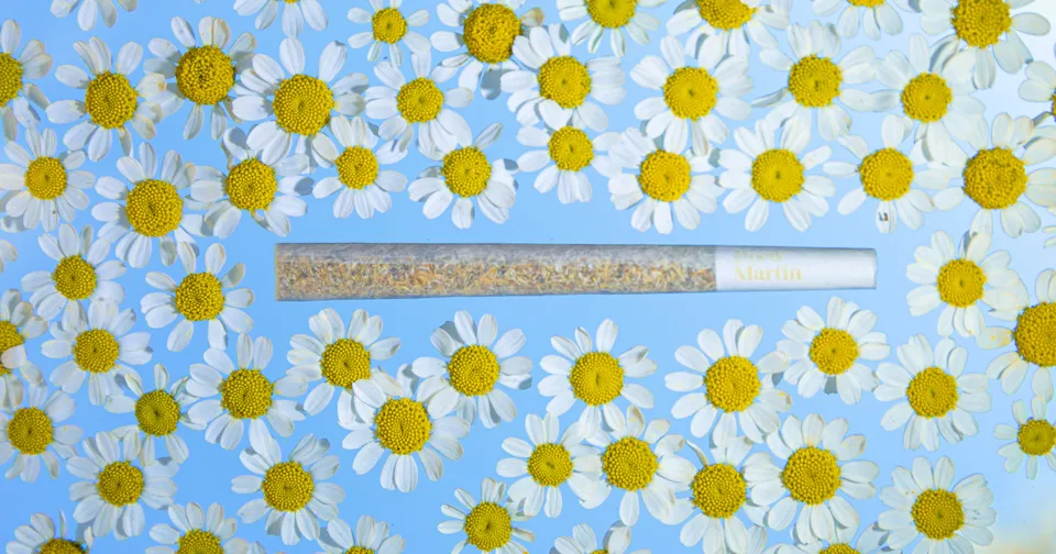 Blue floral patterned notebook cover with a horizontal label space in the center